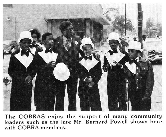 Bernard Powell pictured with some members of the Marching Cobra.