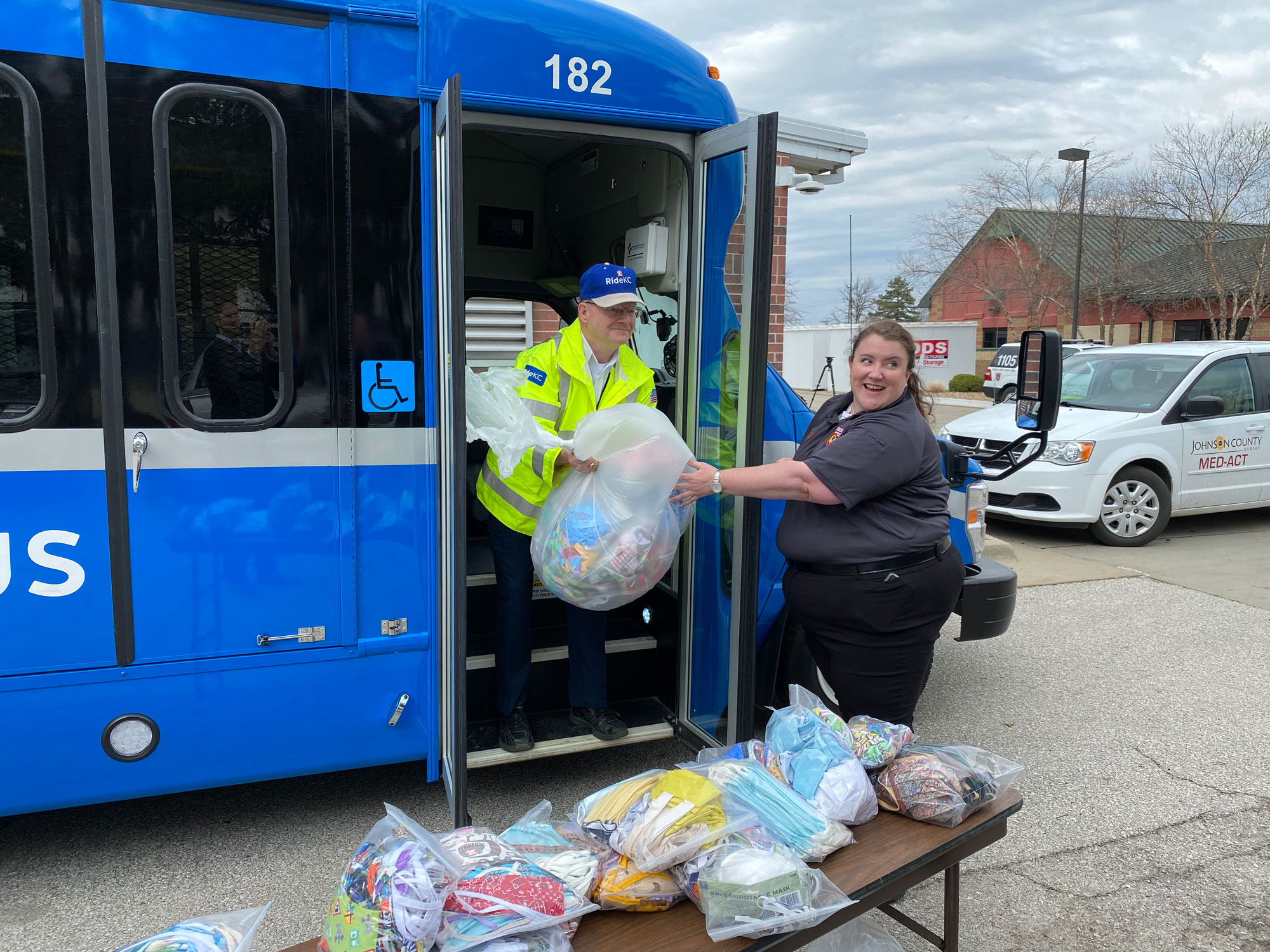 Paul Waters delivers masks to MED-ACT in a RideKC bus.